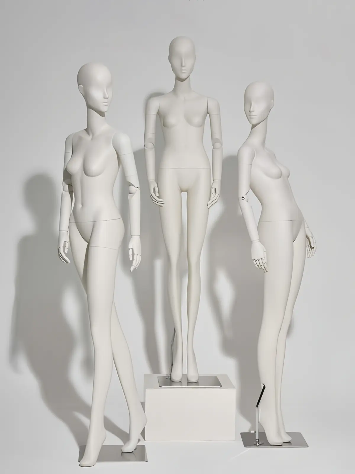 Female mannequin with adjustable arms for visual merchandising, perfect for displaying clothing in storefront windows. Available for wholesale directly from the factory - Morshopfitting (5)